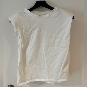 Sleeveless top with shoulder pads